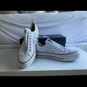 White platform all star converse sneakers.